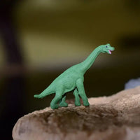 Dinosaure en Jouet: Petit dinosaure vert