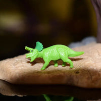 Dinosaure en Jouet: Petit dinosaure vert